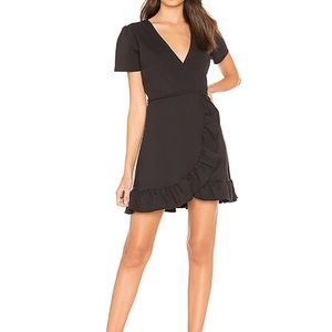 Donna Mizani ruffle wrap dress